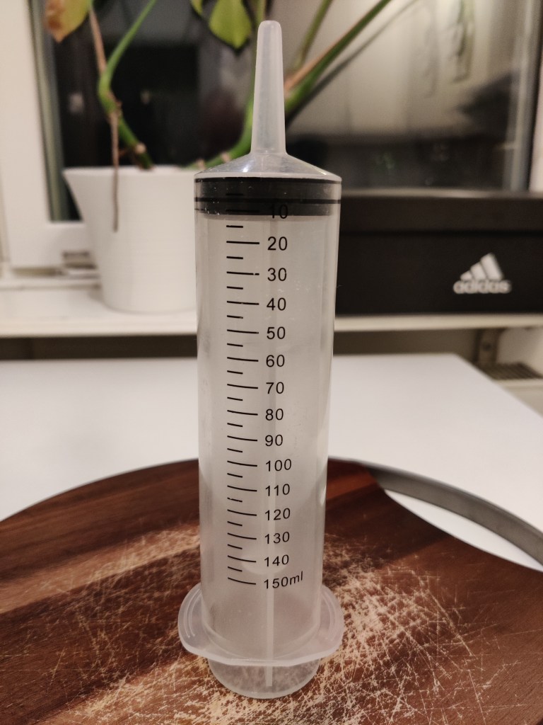 150 ml spruta för fekal transplantation.